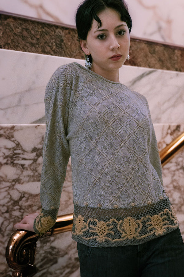 A lady wearing a Pared Woman Pullover Swaeter made with Alpaca & Silk by Qiviuk Boutique