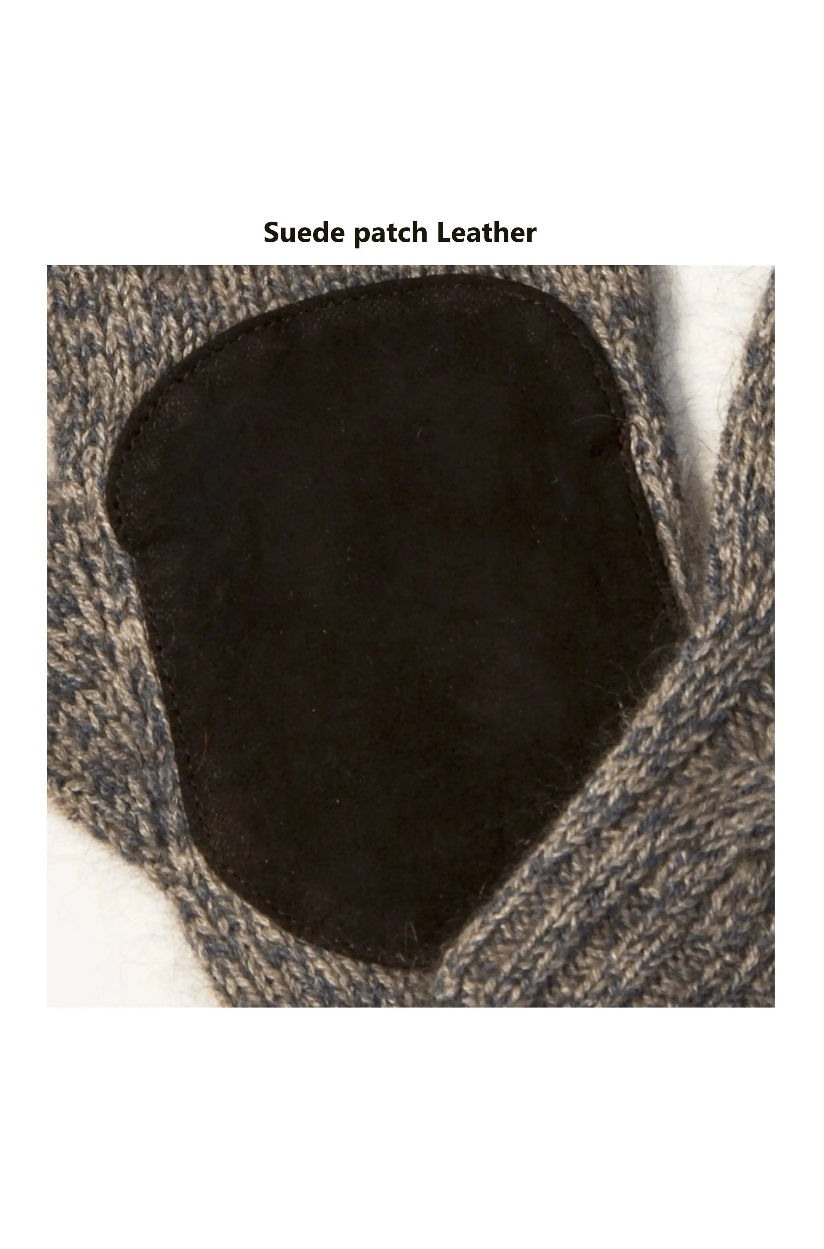 Close up of the leatherpadding of the Robert Men's Gloves with convertible finger tips, finely knitted from a blend of Qiviuk, Merino, and Silk