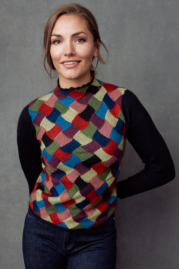 A front view of a Mirella Woman Pullover sweater made of Qiviuk, Merino & Silk by Qiviuk Boutique