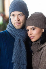 Woman and Man wearing Renzo Hat Qiviuk, Merino & Silk in light blue by Qiviuk Boutique